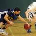 Eastern Washtenaw Multicultural senior Yasser Farha and Greenhills junior Derek Heitman reach for a loose ball during the second half at Greenhills on Thursday. Melanie Maxwell I AnnArbor.com